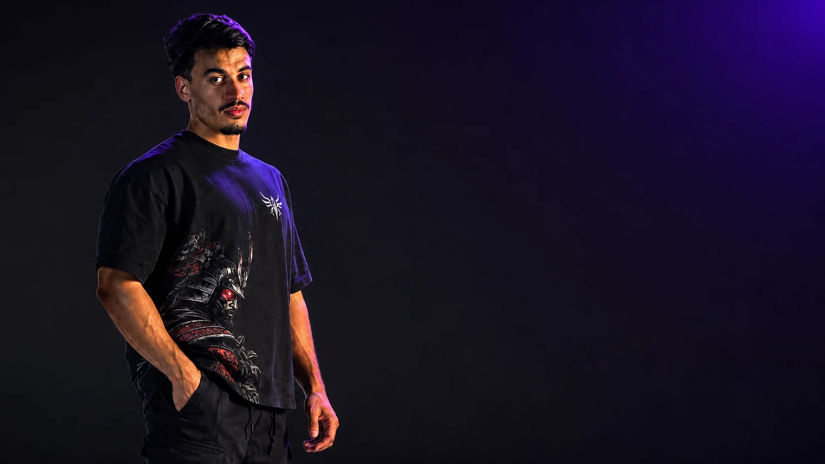Elitewear’s violet-lit streetwear campaign